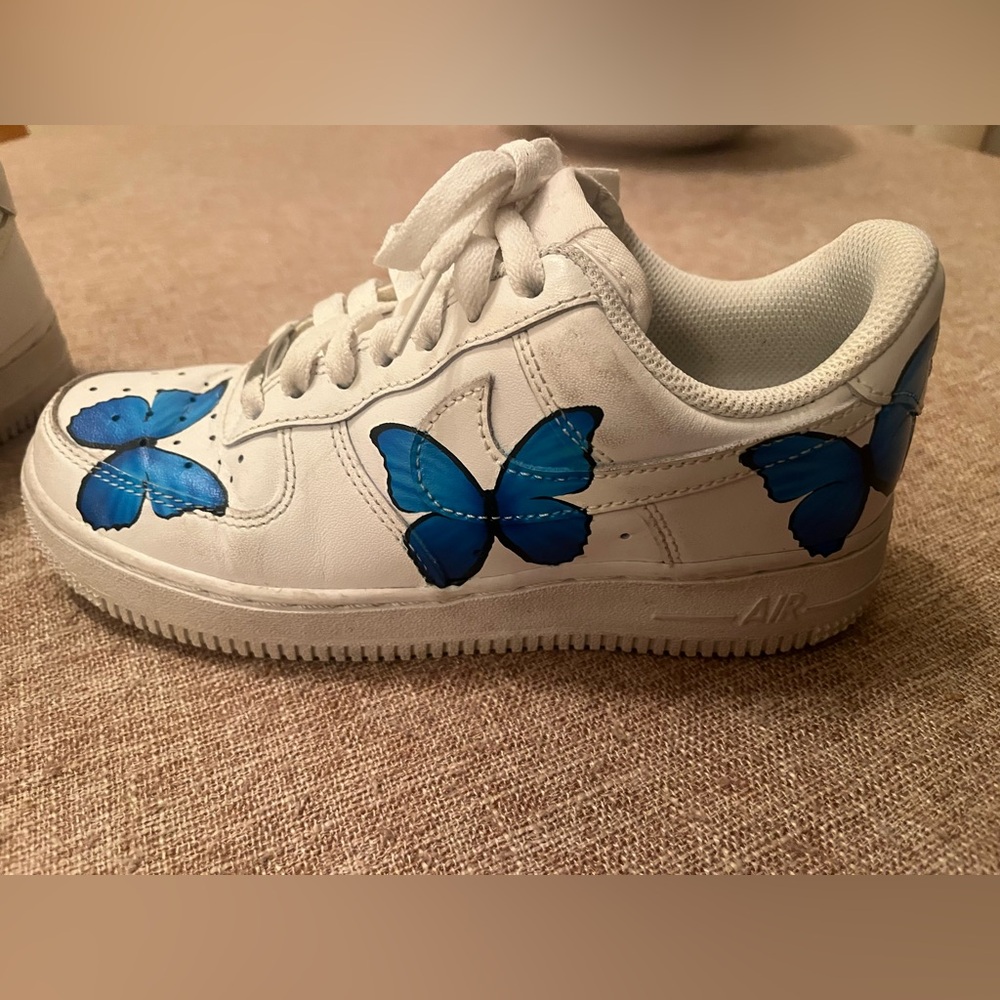 Women’s Nike Air Force sneakers with blue butterflies